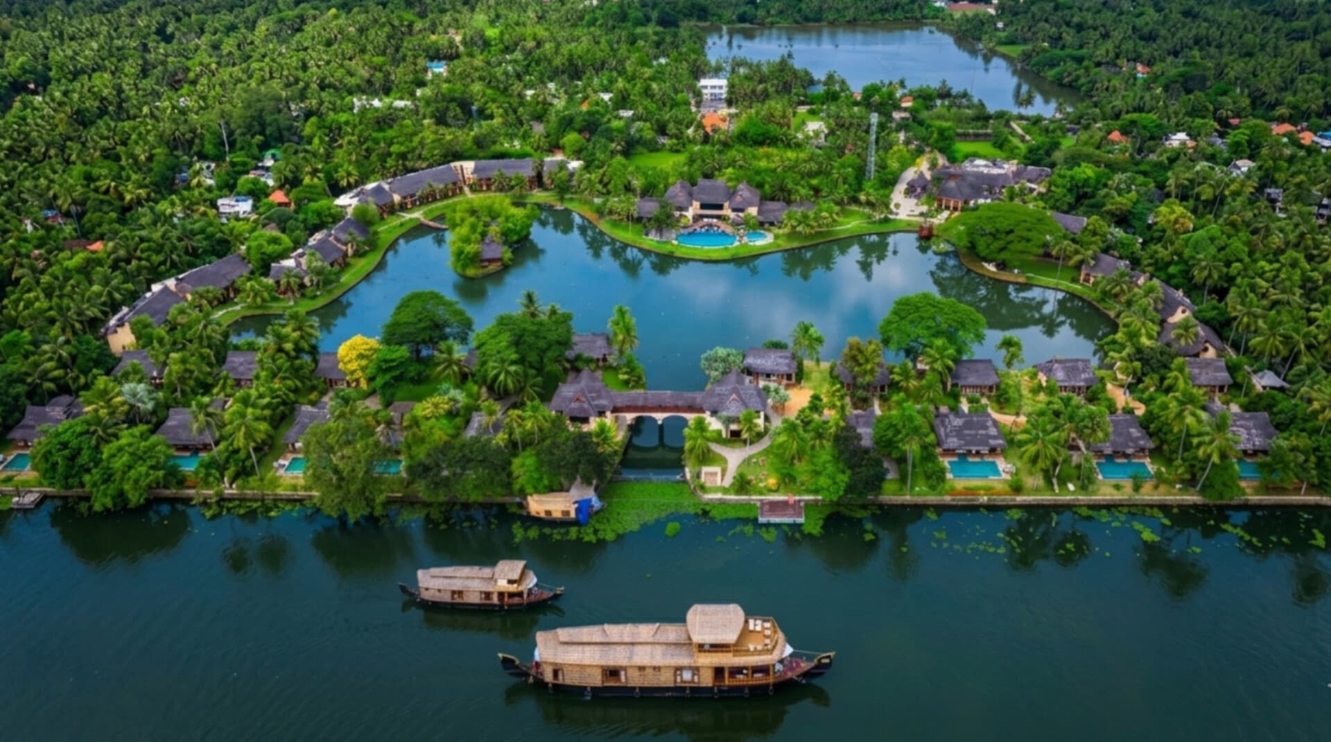 Aerial view of Zuri Kumarakom Resort & Spa on the banks of Vembanad Lake in Kerala