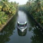 SWTD solar electric boat operating on the Veli Kadinamkulam boat service along Parvathy Puthanar canal in Trivandrum.